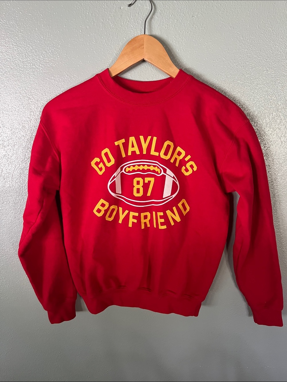 Gildan Red Crewneck Sweatshirt with Yellow Football Graphic